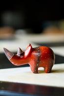 One Dozen Miniature Soapstone Rhinos