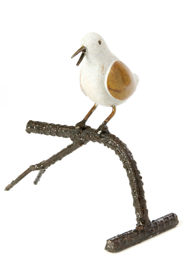 Single Songbird on Branch Stone and Metal Sculpture